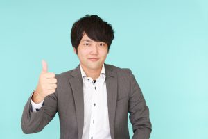 Asian,Business,Man,Showing,Thumbs,Up,Sign