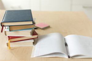 Stack,Of,Books,On,Wooden,Table.,Heap,Fo,Books,On