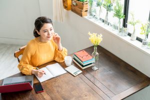 Young,Asian,Woman,Working,In,Office.