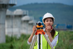 Construction,Workers,Wearing,A,Safety,Vest,And,A,Hard,Hat